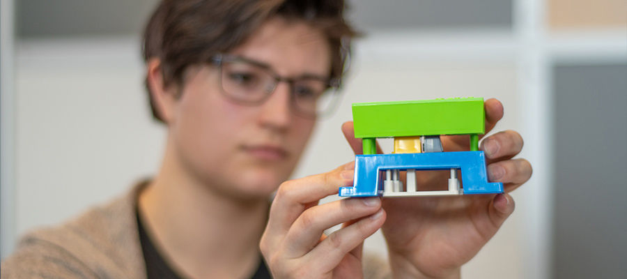 engineer student reviewing protolabs injection molding demo mold