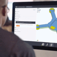 designer looking at injection molding feedback